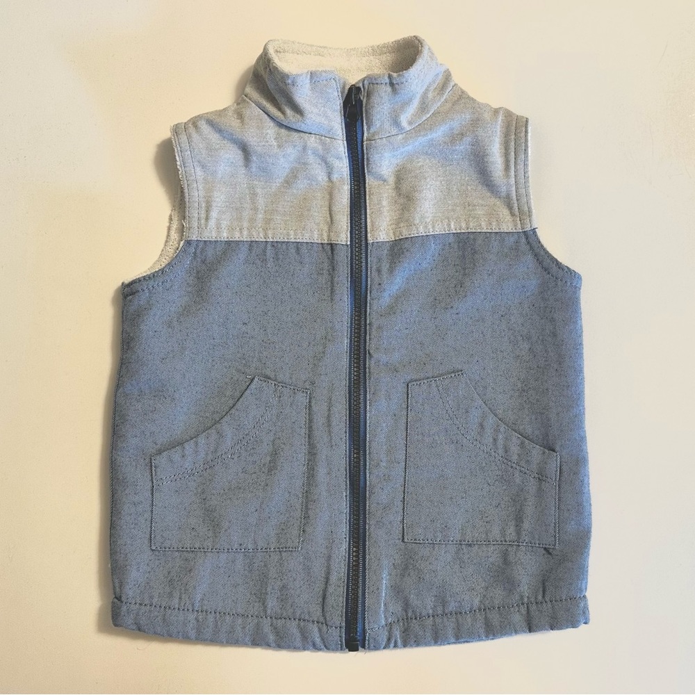 Light blue vest. 9-12 months